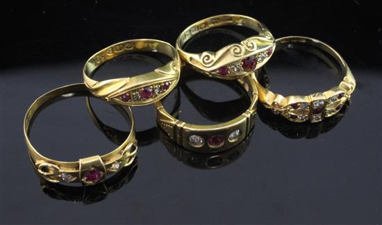 Five late Victorian/Edwardian 18ct gold, ruby and diamond set rings, various sizes.